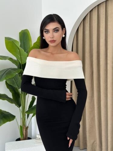 femme portant robe bardot noir et blanc longue elegante
