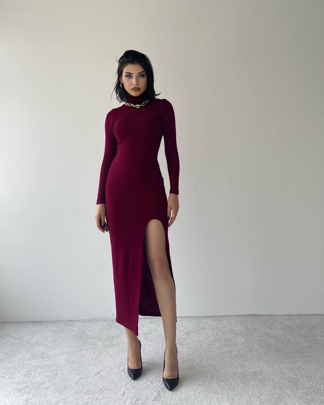 Mid length bodycon dress with slit and turtleneck